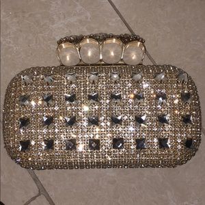 Brand new shiny gold clutch
